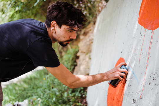 Graffiti artist painting