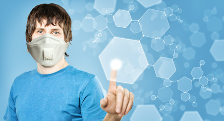 Young man in a face mask using virtual digital technology