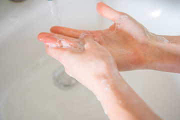 Washing hands rubbing with soap man for corona virus prevention, hygiene to stop spreading coronavirus.