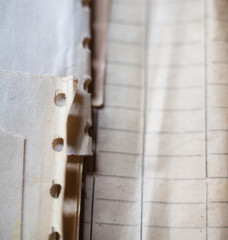 Old paper with punched holes