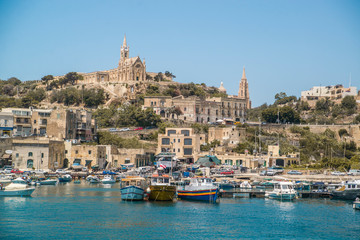 Fototapeta na wymiar view of boats in the port in malta