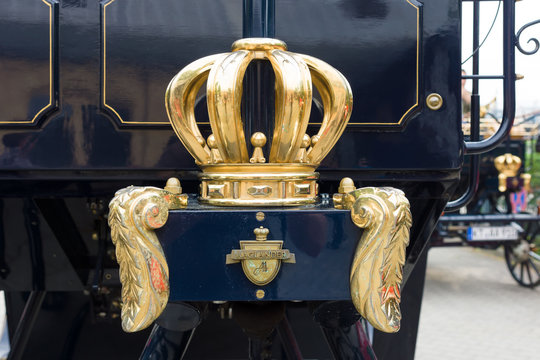 BERLIN - MAY 11, 2013:  Detail of a crown, self-propelled carriage AAGLANDER-Mylord (modern replica), 26. Oldtimer-Tage Berlin-Brandenburg.