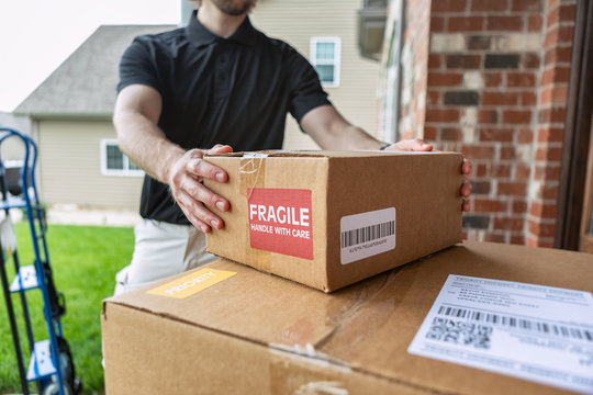 Shipment: Man Drops Off Packages At Door
