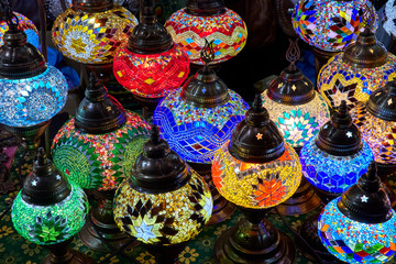 Fototapeta na wymiar Horned lamps with bright colors put up for sale in the market.