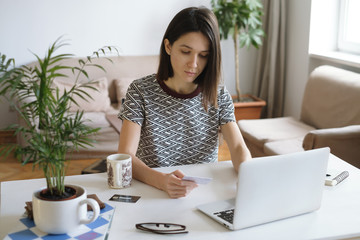Woman working online at home