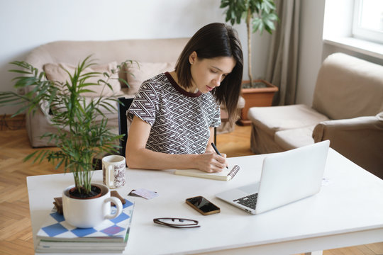 Woman working online at home