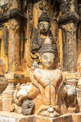 Fototapeta na wymiar Ancient statue at pagoda field at Sagar