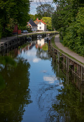 Fototapeta na wymiar Trosa. Canal in the center of the town surrounded by trees