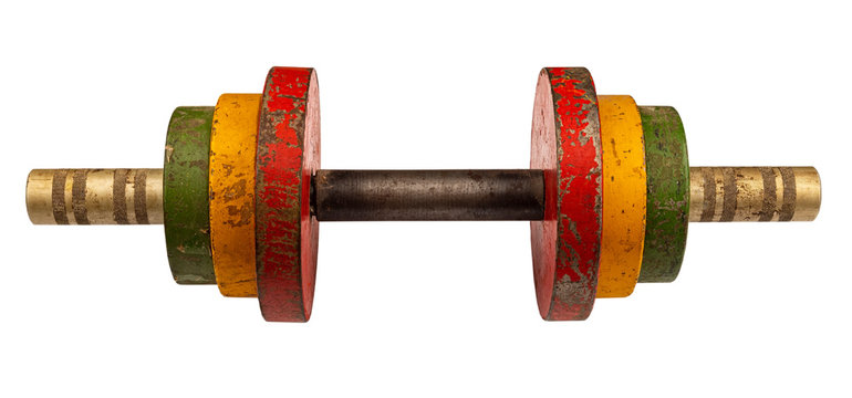 An old vintage dumbbell with multi-colored discs. Isolate on a white background. Home fitness training.