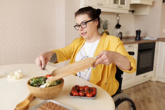 Disabled Woman Cooking Salad