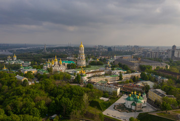 Fototapeta na wymiar Aerial view of Kiev Pechersk Lavra illuminated by the sunset rays of the sun, Kyiv, Ukraine