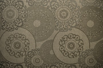 Abstract patterns on the wallpaper gray