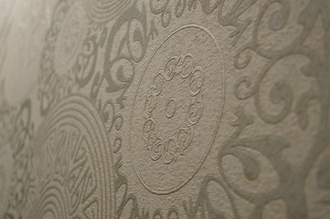 Abstract patterns on the wallpaper gray
