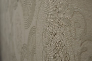 Abstract patterns on the wallpaper gray