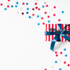 Obraz premium 4th of July American Independence Day. Happy Independence Day, decorations on white background. Flat lay, top view, copy space