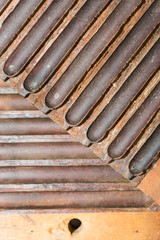 Men's hands twist Cuban cigars using traditional methods and equipmentby hand.