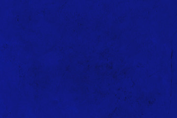 Obraz premium Blue stucco texture. Decorative wall surface texture. Classic blue decorative background in grunge style.