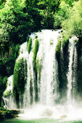 Fototapety  Wodospad Kravice na rzece Trebizat w Bośni i Hercegowinie. Cud natury w Bośni i Hercegowinie. Wodospady Kravica, pierwotnie znane jako Wodospady Kravica