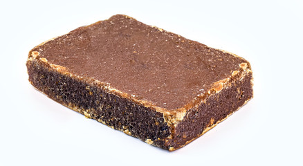 Sweet made from sugar cane of Azorean or Canarian origin, called Rapadura, pan, cardboard, piloncillo, chancaca, empanisation and tapa-doce. . Isolated white background.