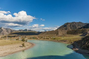 White mountain river in Altai. Altay where Russia, China, Mongolia, and Kazakhstan come together, and where the rivers Ob and Irtysh have their headwaters. Russia