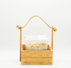 Donation box  with oatmeal. Food supplies, food stock for quarantine, isolation period on white. Donation, coronavirus