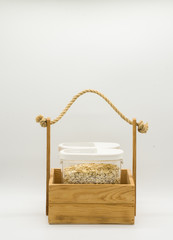 Donation box  with oatmeal. Food supplies, food stock for quarantine, isolation period on white. Donation, coronavirus
