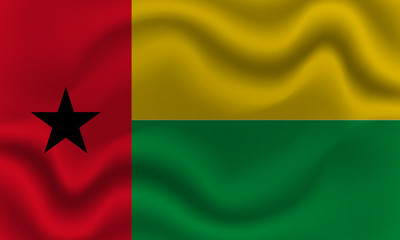 national flag of Guinea Bissau on wavy cotton fabric. Realistic vector illustration.