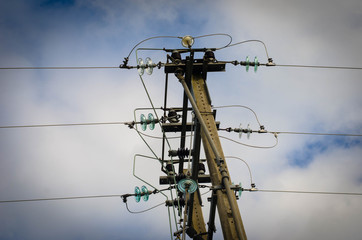 electric pole with sky in the background