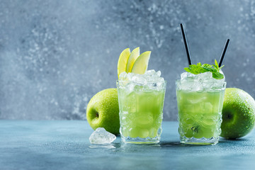 Green cocktail with ice and mint