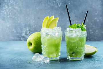 Green cocktail with ice and mint