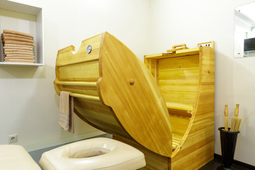 Obraz na płótnie Canvas A cozy and beautiful massage room which has everything you need for relaxation and aroma sauna