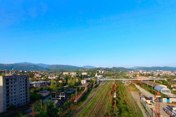 Fototapeta na wymiar Aerial view of the urban landscape with the railway.