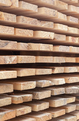 Wooden planks. Air-drying timber stack.