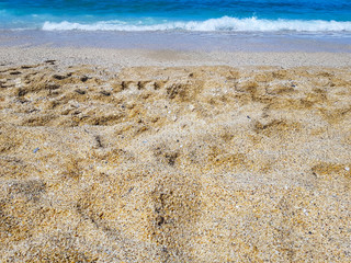 Golden sand on the coast of Alanya in Turkey. Cleopatra beach