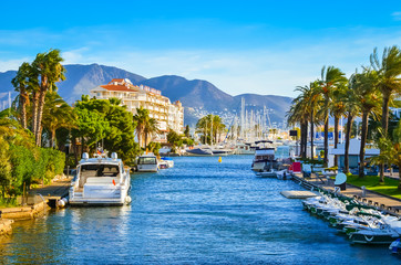 Summer panorama of Empuriabrava with yachts, boats and waterways in Costa Brava, Catalonia, Spain - obrazy, fototapety, plakaty