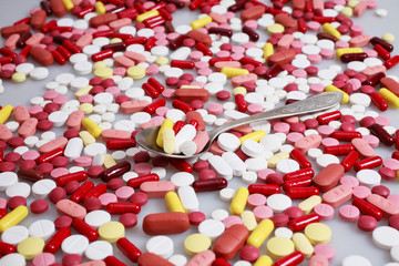 Colorful pills isolated on white background