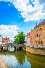 Beautiful canal and traditional houses in the old town of Bruges (Brugge), Belgium
