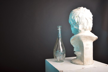 Bust with Glass Bottle