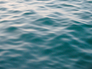 Naklejka premium blue water surface ripples texture