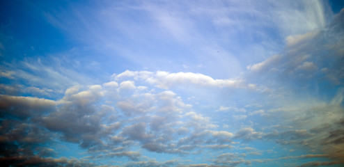 Fototapeta na wymiar The divine sky and sun. Beautiful blue background.