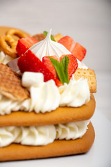 Сake heart cake with strawberries and mint