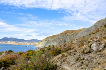 Mountain seascape, mountain vegetation and mountain trails on the coast.