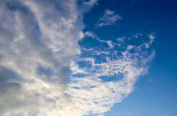 Stunning cirrus cloud formation panorama in a deep blue sky