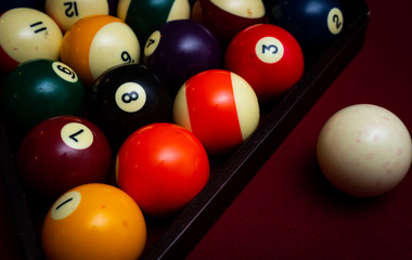 Billiard balls racked in a triangle 