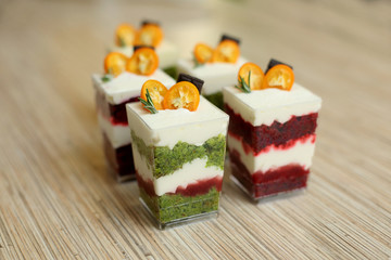 desserts from sponge cake with cream in jars