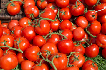counter with tomatoes on the vegetable market in europe