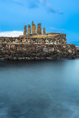 Moais in Ahu Vai Uri, Tahai Archaeological Complex, Rapa Nui National Park, Easter Island. Long...