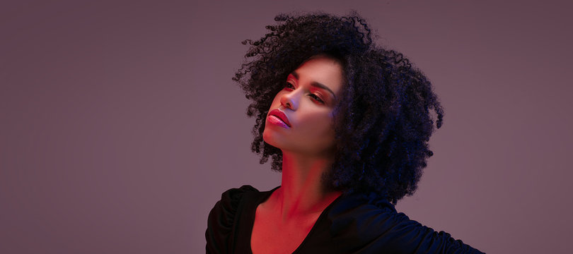 African American Woman With Afro Hairstyle.