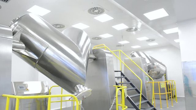 pharmaceutical factory. Mixer tank for powder mixture preparation at tablet production