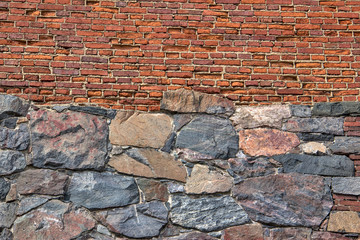 Mixed brick and stone wall texture background